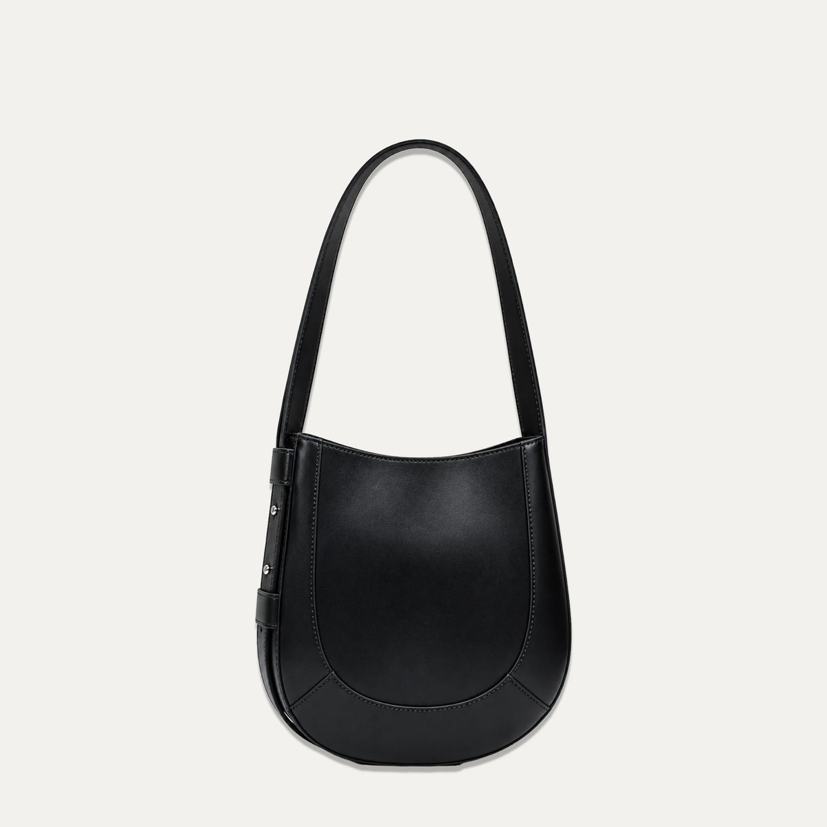 A black leather shoulder bag with a curved, crescent-shaped body and a single shoulder strap, shown against a light off-white background.