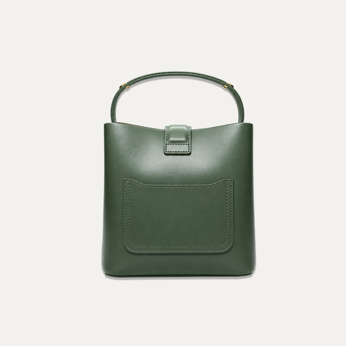 A dark green leather bucket bag with a top handle, a front slip pocket, and a small central strap detail, shown against a light off-white background.